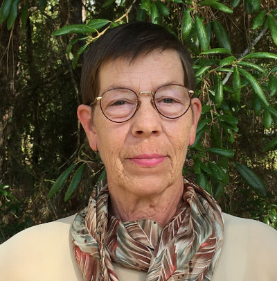 barbara byram with neck scarf and glasses