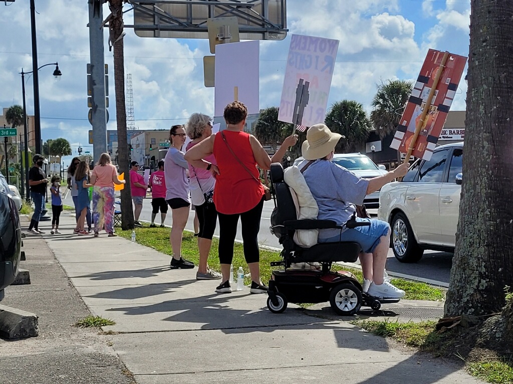 pro-choice rally people on sidewalk